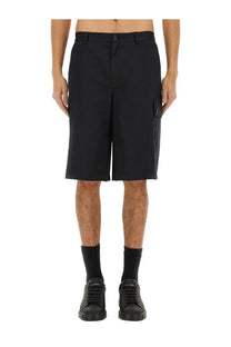 Dolce &amp; Gabbana men’s black cotton cargo Bermuda shorts with structured fit and side pockets made from durable fabric