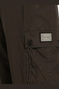 Dolce &amp; Gabbana men’s cotton cargo trousers in dark olive green with branded patch and button closure