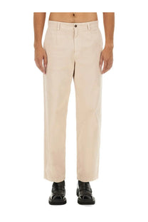 Beige cotton chino trousers by Dolce and Gabbana with straight-leg cut and subtle front pleats for men