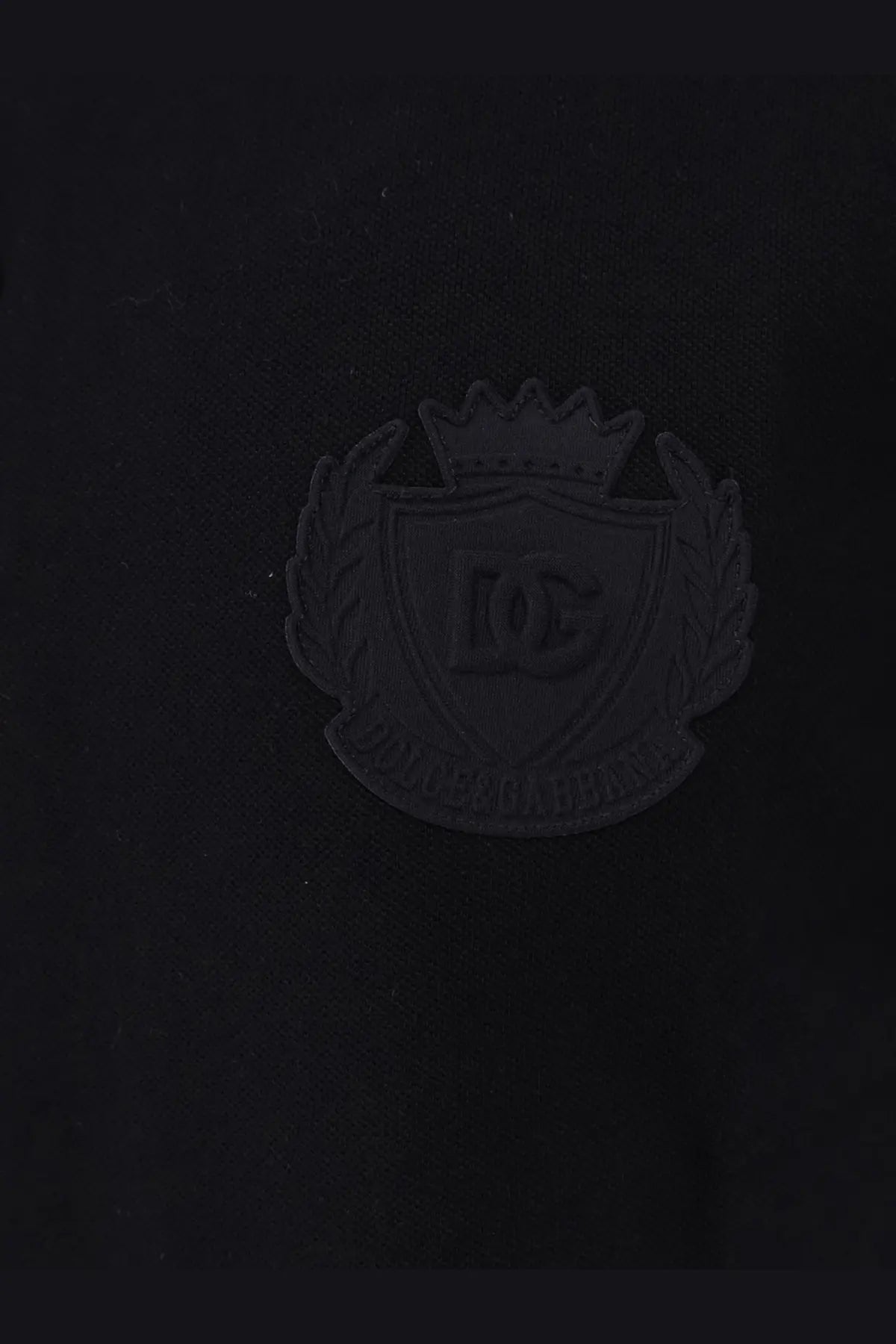 Black dc shoes logo patch with crown and shield on dolce and gabbana men’s black cotton polo shirt