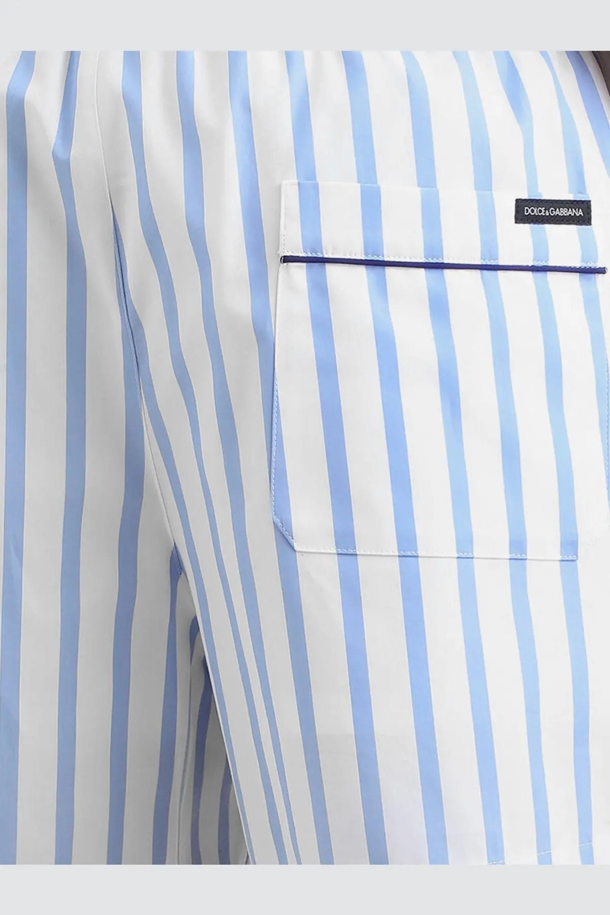 Dolce &amp; Gabbana men’s light blue and white striped cotton poplin shorts with navy trimmed front pocket and black brand label