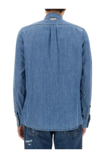 Blue denim dolce &amp; gabbana men’s cotton shirt with buttoned collar and pleated back shown from the back side