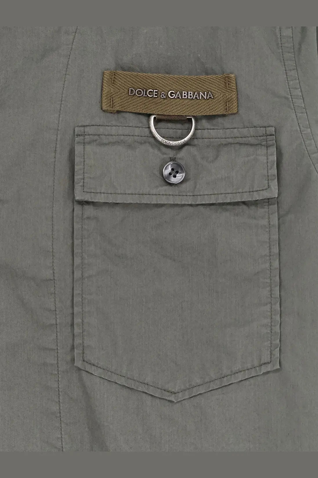 Dolce &amp; Gabbana men’s grey cotton shirt with a gray utility pocket featuring a tan brand label and silver hardware