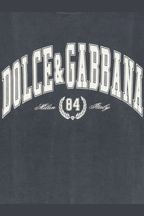 Dark gray dolce and gabbana men’s cotton t-shirt with bold white arched logo milan 84 italy and laurel wreath emblem