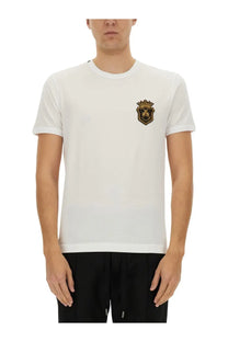 Dolce &amp; Gabbana men’s white cotton t-shirt with gold and black embroidered crest on the left chest