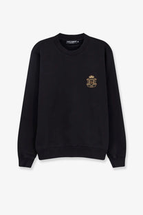 Dolce &amp; Gabbana men’s black cotton sweatshirt with gold embroidered crest on the left chest