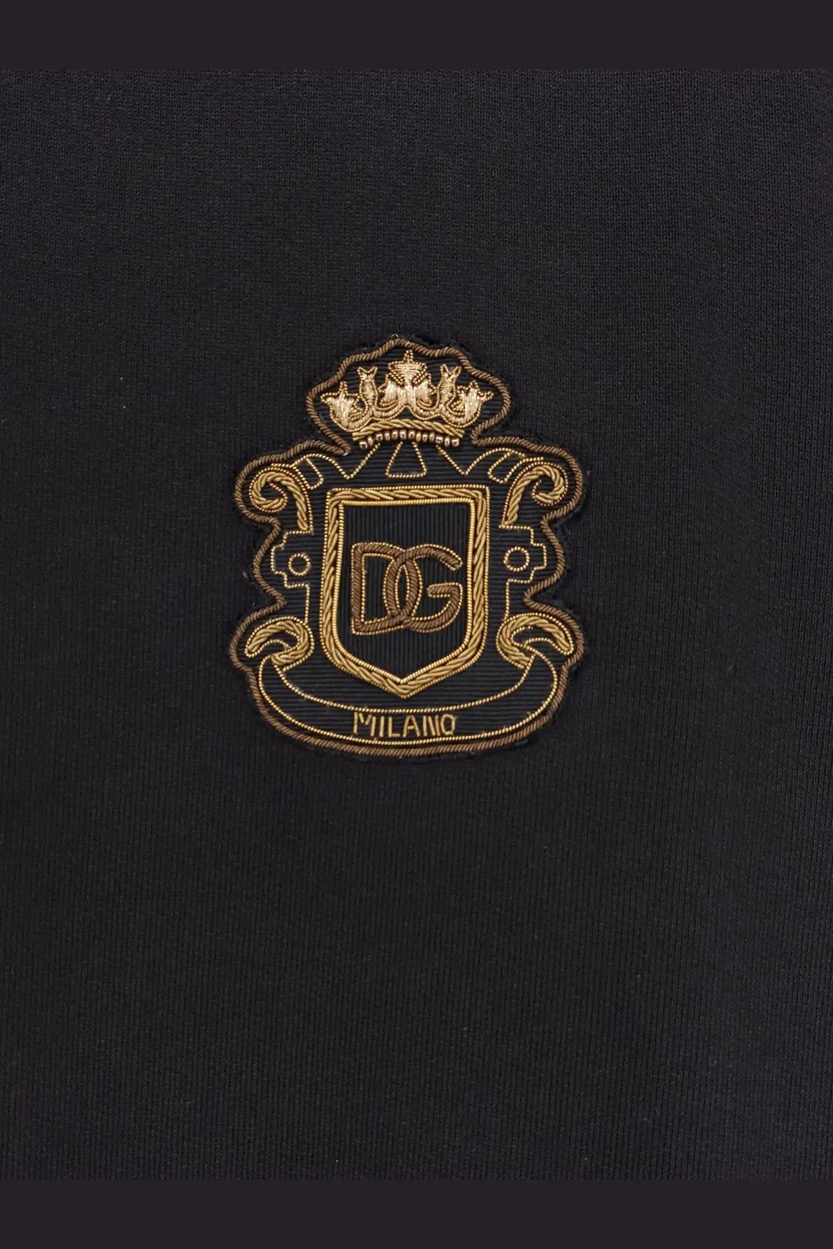 Dolce &amp; Gabbana men’s black cotton sweatshirt featuring a gold-embroidered Milano crest patch on fabric