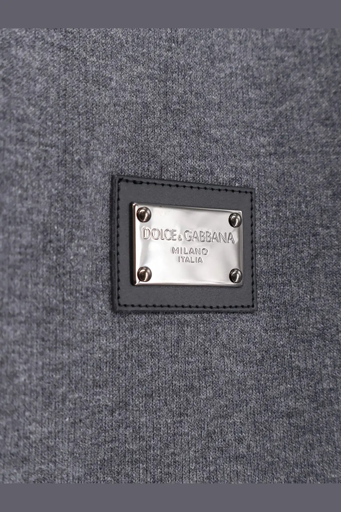 Dolce &amp; Gabbana men’s gray woolen sweater with black leather patch and silver metal plaque logo detail