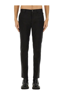 Black tailored cotton trousers by dolce &amp; gabbana with a sleek straight-leg cut and subtle front pleats for men