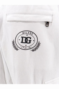 Dolce &amp; Gabbana men’s white cotton jogger with black embroidered milano italia circular logo and laurel wreaths