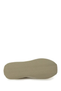 Beige rubber sole with zigzag tread pattern on dolce and gabbana men’s cushion sneaker