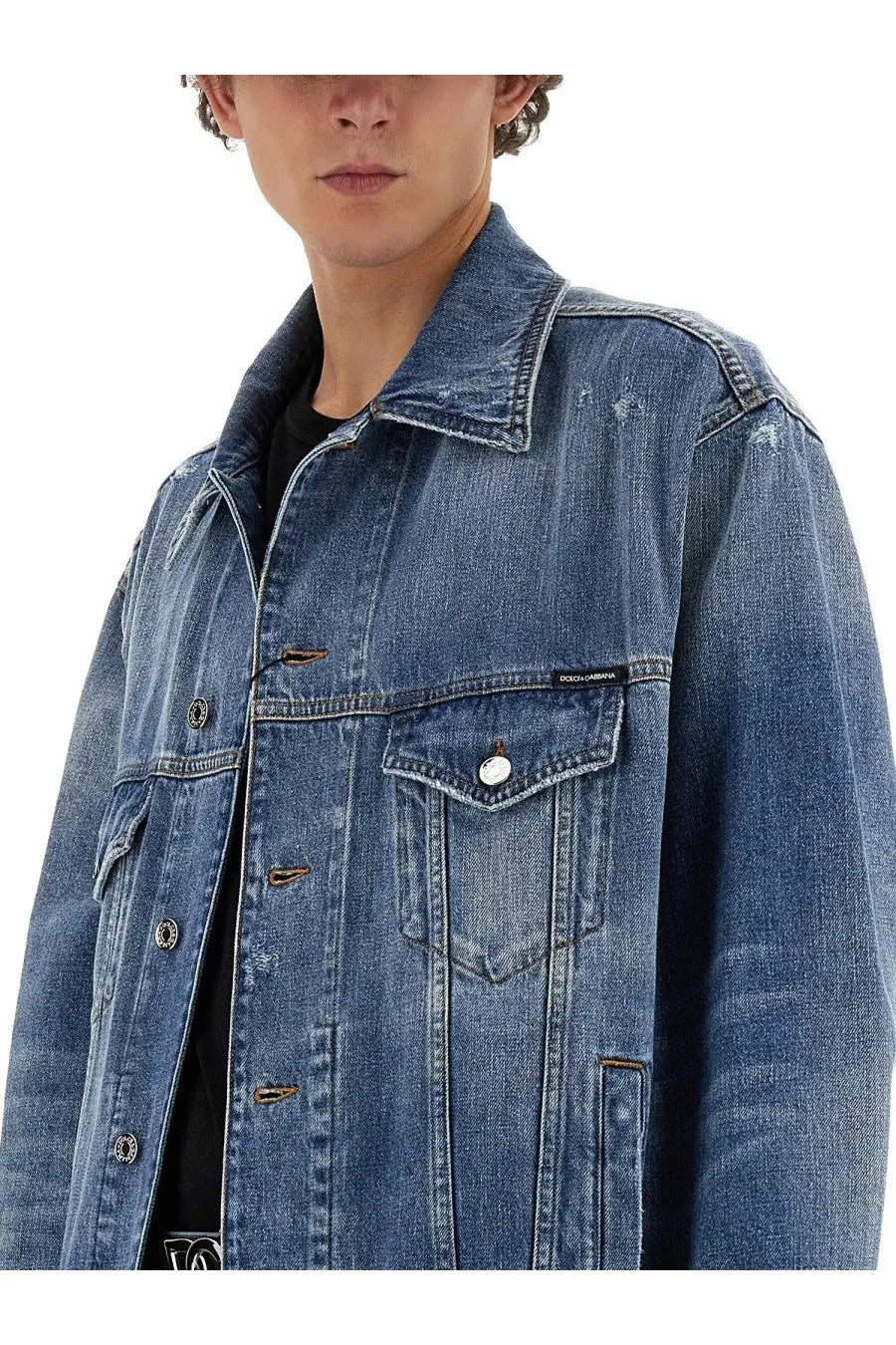 Dolce &amp; Gabbana men’s blue denim jacket with classic collar button closures and front pockets featuring logo patch