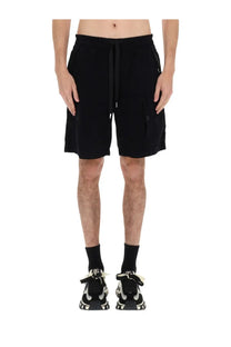 Dolce &amp; Gabbana men’s black cargo shorts with drawstring waistband and side pockets in cotton fabric