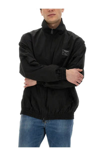 Dolce &amp; Gabbana men’s black nylon bomber jacket with high collar elastic cuffs hem and small label on left chest