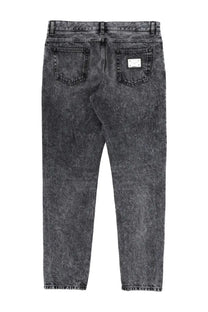Back view of dolce &amp; gabbana men’s dark gray distressed denim jeans with a silver rectangular brand patch on the pocket