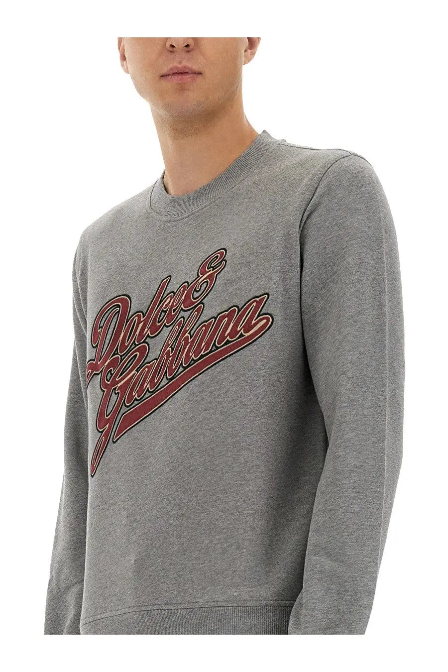 Dolce &amp; Gabbana men’s grey jersey sweatshirt with red and brown cursive logo across the chest