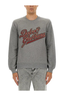 Dolce &amp; Gabbana men’s grey jersey sweatshirt with bold red and black embroidered logo across the chest