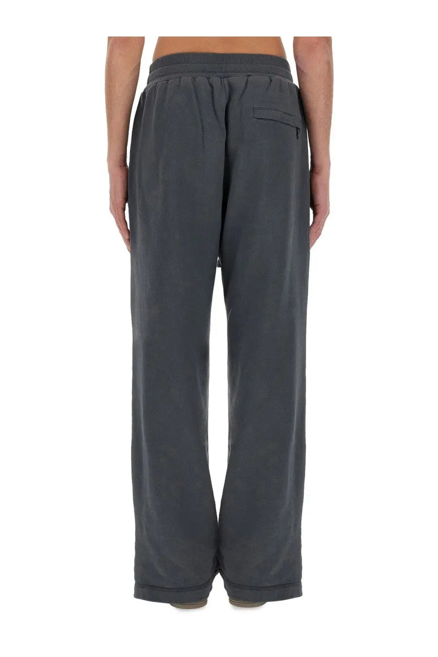 Dark gray dolce &amp; gabbana men’s jogging pants with wide-leg sweatpants style elastic waistband and small back pocket view from back