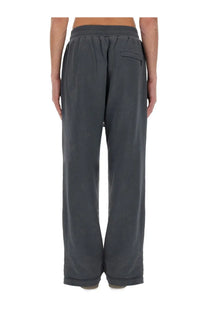 Dark gray dolce &amp; gabbana men’s jogging pants with wide-leg sweatpants style elastic waistband and small back pocket view from back