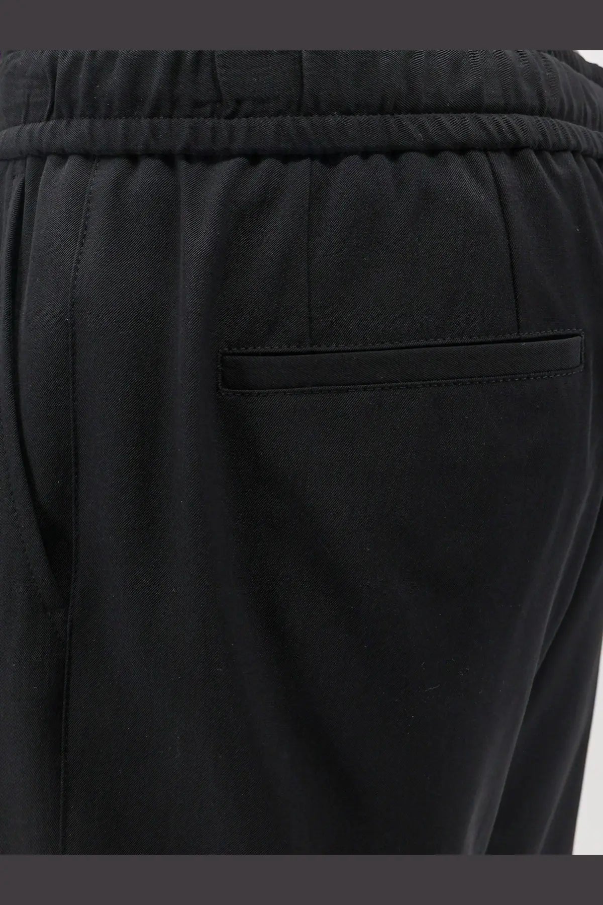 Dolce and Gabbana men’s black jogging stretch virgin wool trousers with drawstring waistband and welt pocket