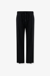 Black wide-leg jogging trousers with drawstring waistband made of stretch virgin wool by dolce and gabbana