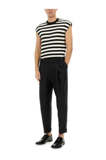 Black pleated tailored fit trousers with rolled cuffs paired with dolce &amp; gabbana men’s multicolor kimono shirt
