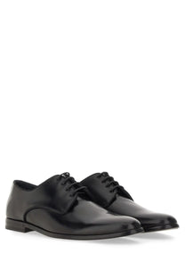 Dolce &amp; Gabbana men’s leather derby black dress shoes with polished finish and classic lace-up design