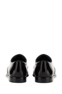 Dolce &amp; Gabbana men’s leather derby black patent leather dress shoes with polished finish and classic oxford design
