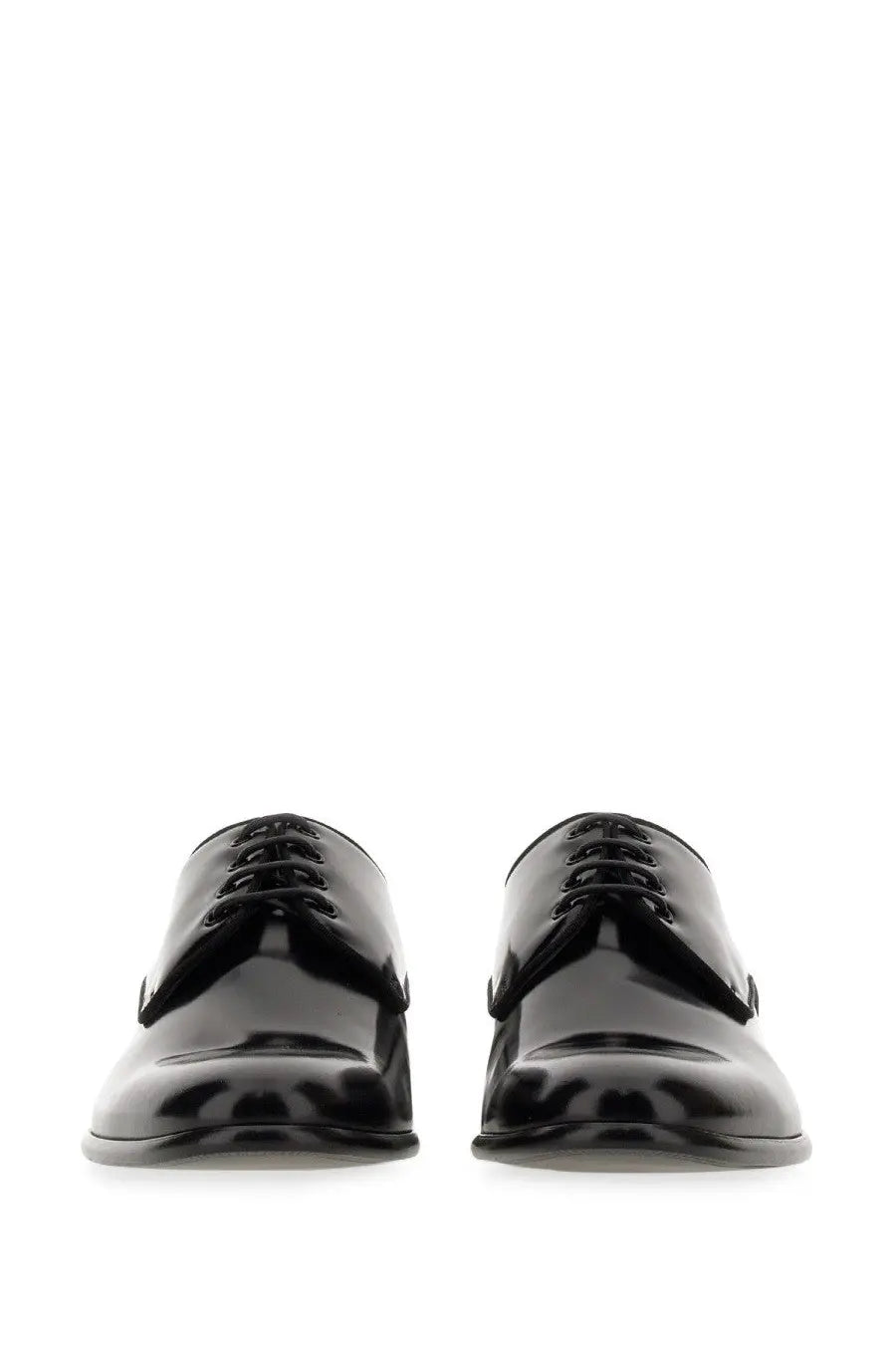Dolce &amp; Gabbana men’s black patent leather derby shoes with a sleek polished finish and classic lace-up design