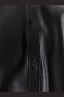 Dolce &amp; Gabbana men’s black leather shirt jacket with subtle stitching along the front placket