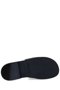 Dolce &amp; Gabbana men’s black leather slide sandal with minimalist design and embossed brand name on the sole