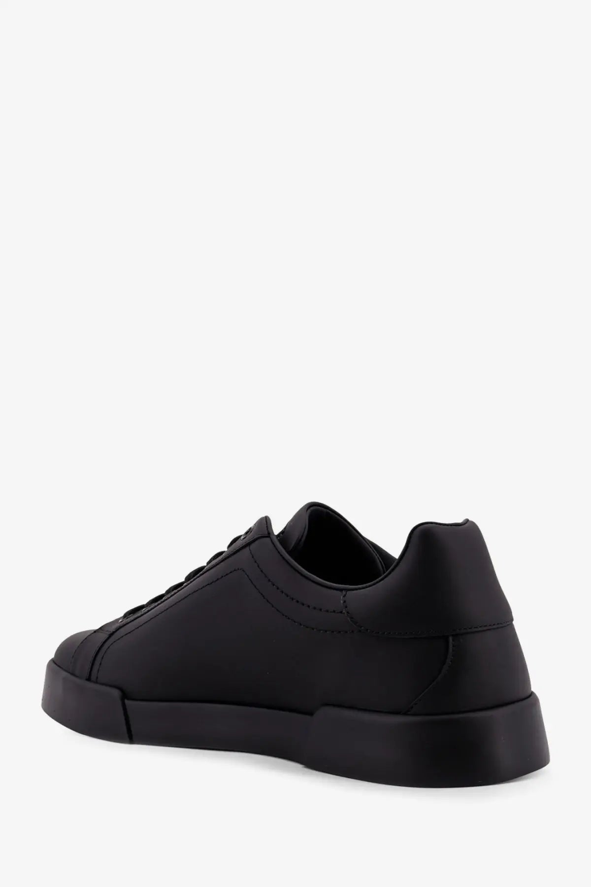 Dolce &amp; Gabbana men’s black leather low-top sneakers with chunky rubber sole and minimalist design