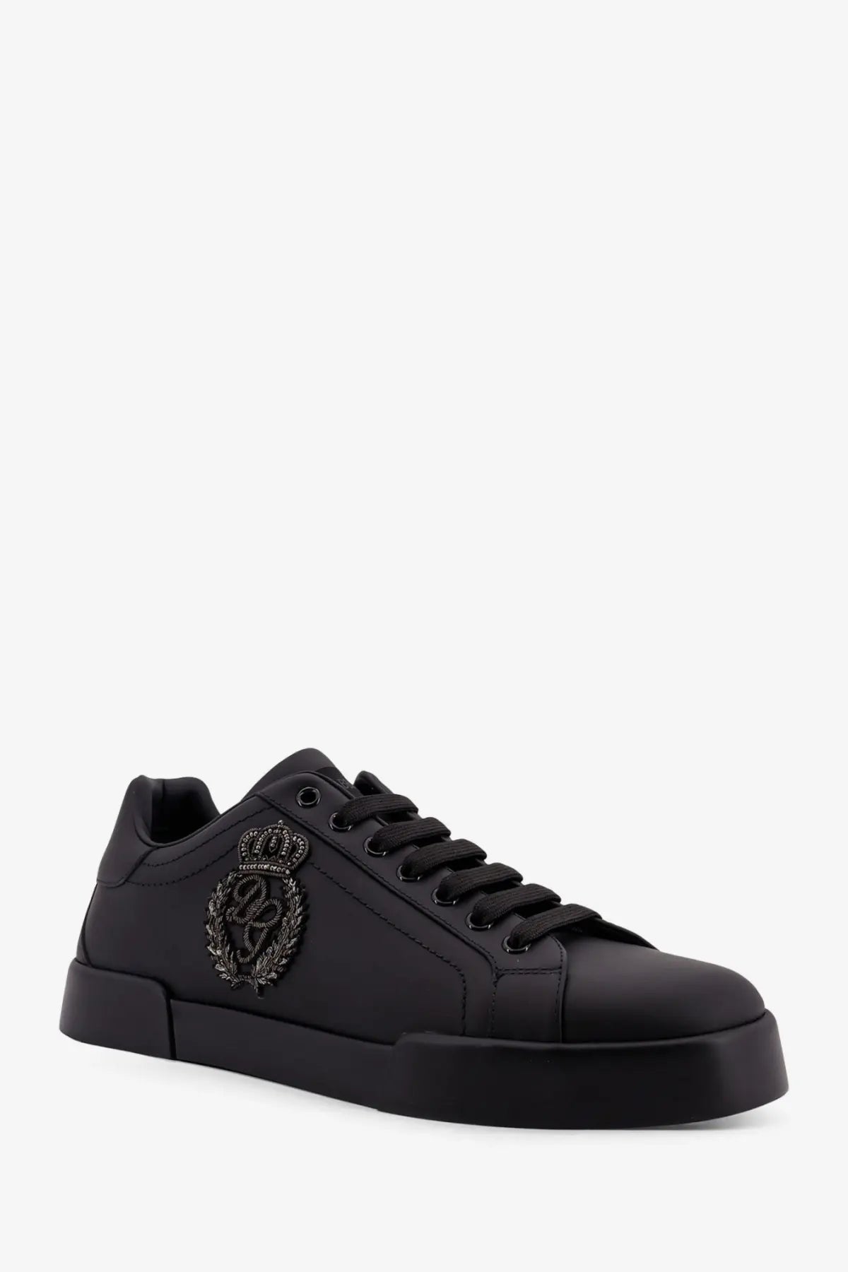 Dolce &amp; Gabbana men’s black leather low-top sneaker with glossy finish and embroidered crown crest on the side