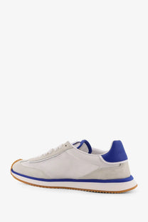Dolce &amp; Gabbana men’s white leather sneakers with light gray suede and mesh, featuring bold royal blue accents