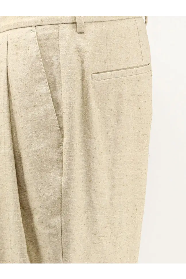 Beige dolce and gabbana men’s linen and silk trousers with subtle textured weave and tailored pleats