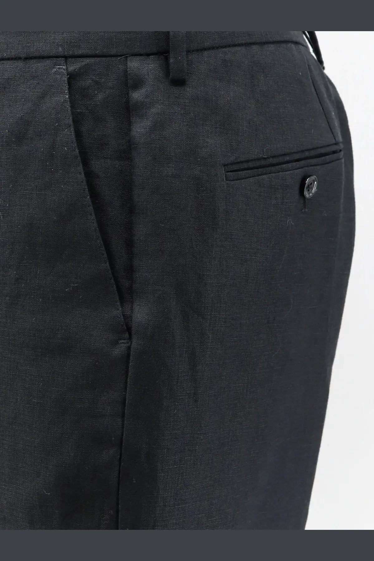Dolce and gabbana men’s black linen trousers with textured weave and single buttoned pocket visible on back side