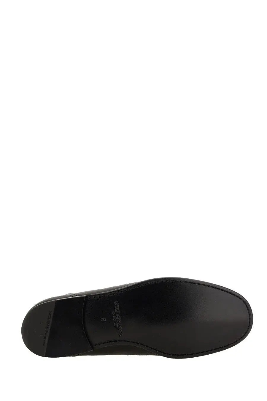 Dolce &amp; Gabbana men’s black leather loafer sole with smooth glossy finish and visible edge stitching