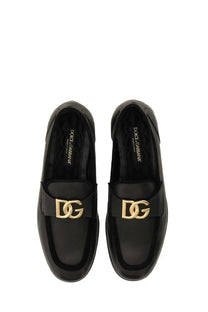 Dolce &amp; Gabbana men’s black patent leather loafers with gold-tone dg logo accents for stylish wear