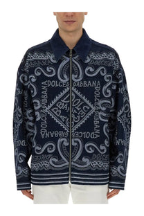 Dolce &amp; Gabbana men’s navy cardigan with intricate white paisley and brand name patterns on front