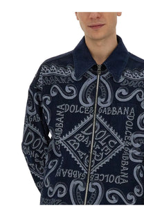 Dark blue denim jacket with all over white embroidered dolce and gabbana logo and ornate swirls for men