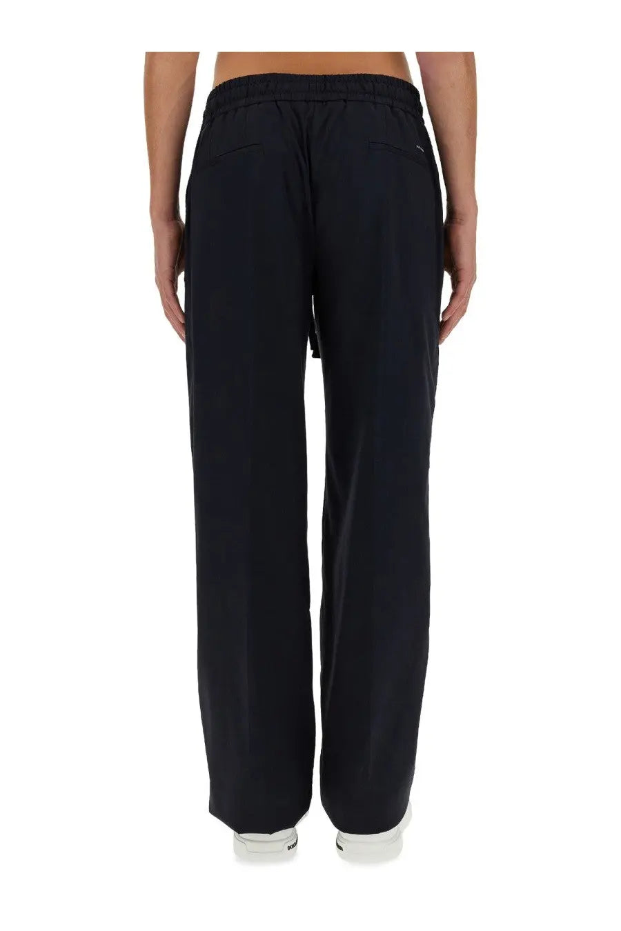 Dolce &amp; Gabbana men’s black nylon wide-leg trousers with elastic waistband and subtle side pockets