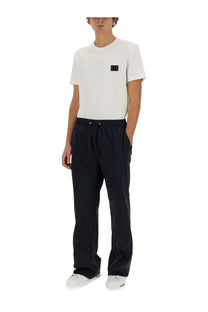 Navy blue dolce &amp; gabbana men’s nylon drawstring trousers with relaxed fit and subtle front pleats