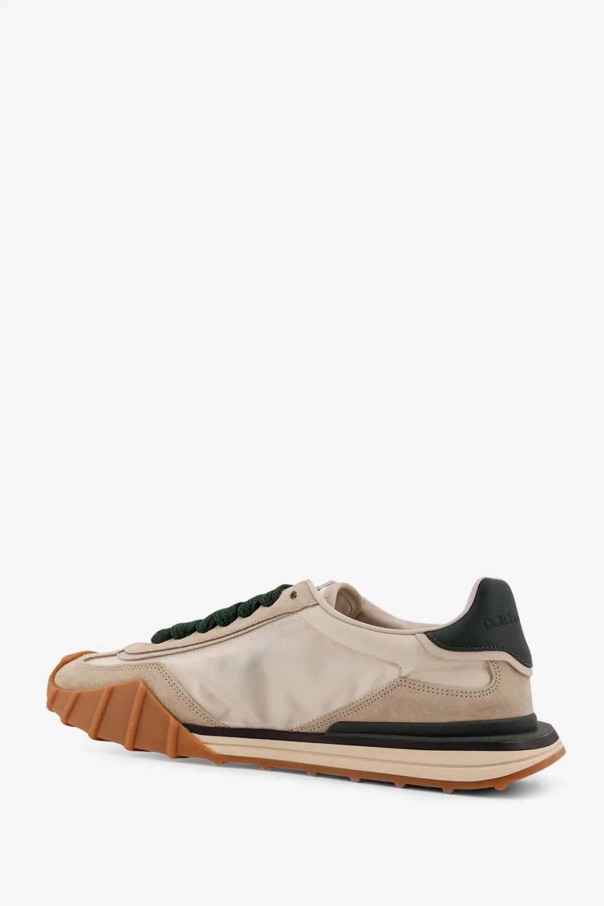 Beige and black Dolce &amp; Gabbana men’s nylon sneakers with tan rubber sole featuring a sleek modern design