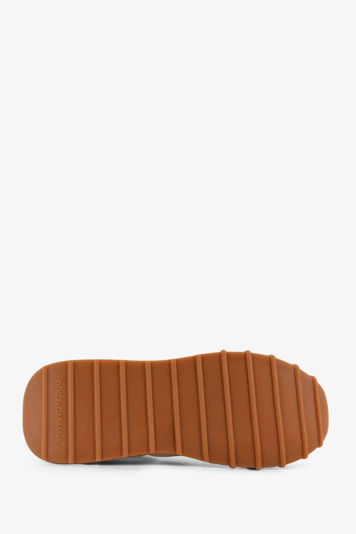 Back view of dolce &amp; gabbana men’s white nylon sneakers with tan rubber sole and embossed heel detail