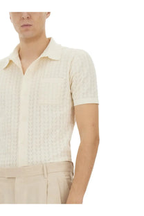Cream-colored Dolce &amp; Gabbana men’s perforated cotton knit short-sleeved polo shirt with subtle texture