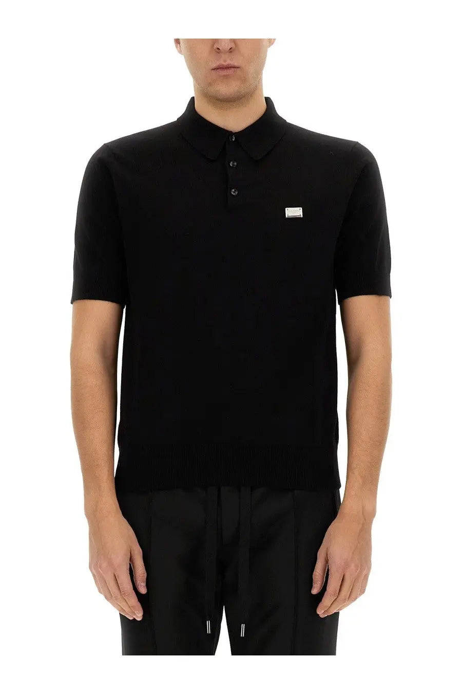 Dolce &amp; gabbana men’s black short-sleeved polo shirt with subtle textured knit and small chest logo patch