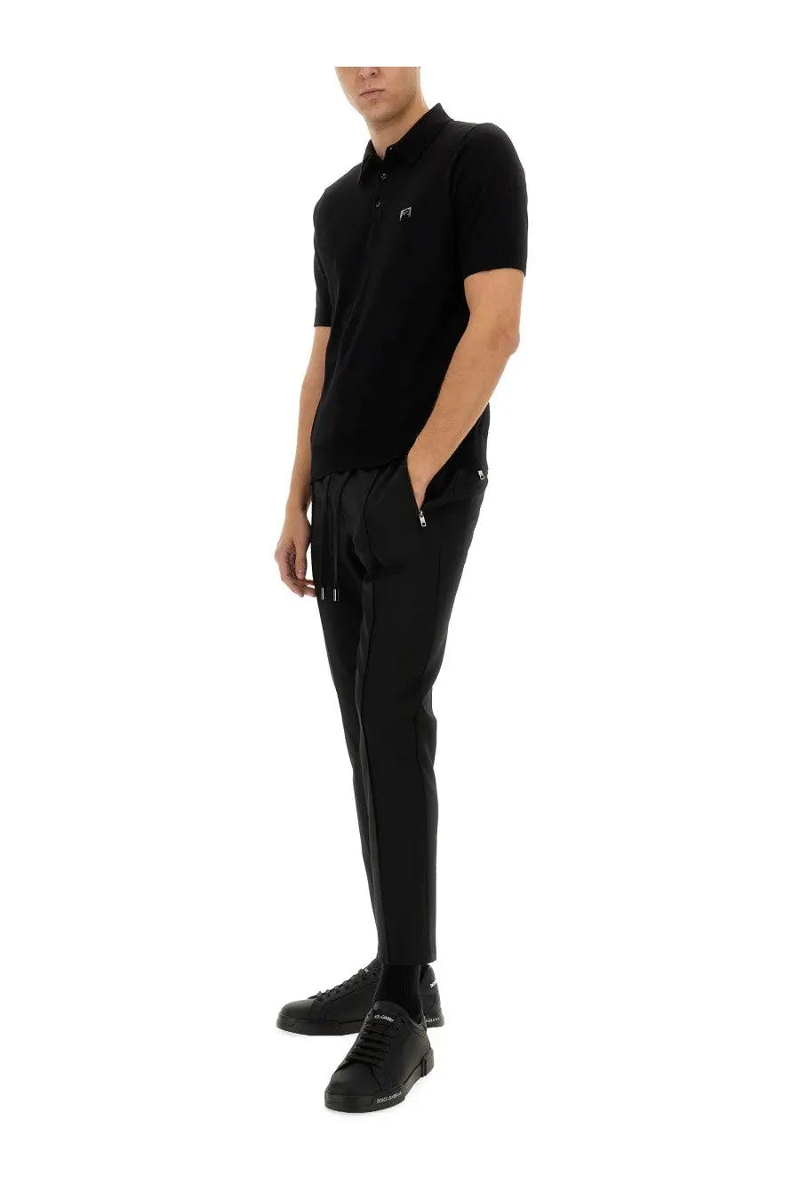 Dolce &amp; Gabbana men’s black short-sleeved polo shirt with a subtle chest logo and soft cotton material