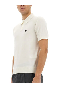 Dolce &amp; gabbana men’s white knit polo shirt with ribbed collar cuffs and small black logo patch on chest