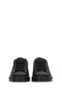 Dolce &amp; Gabbana men’s Portfino black leather low-top sneakers with sleek minimalist design and subtle heel branding