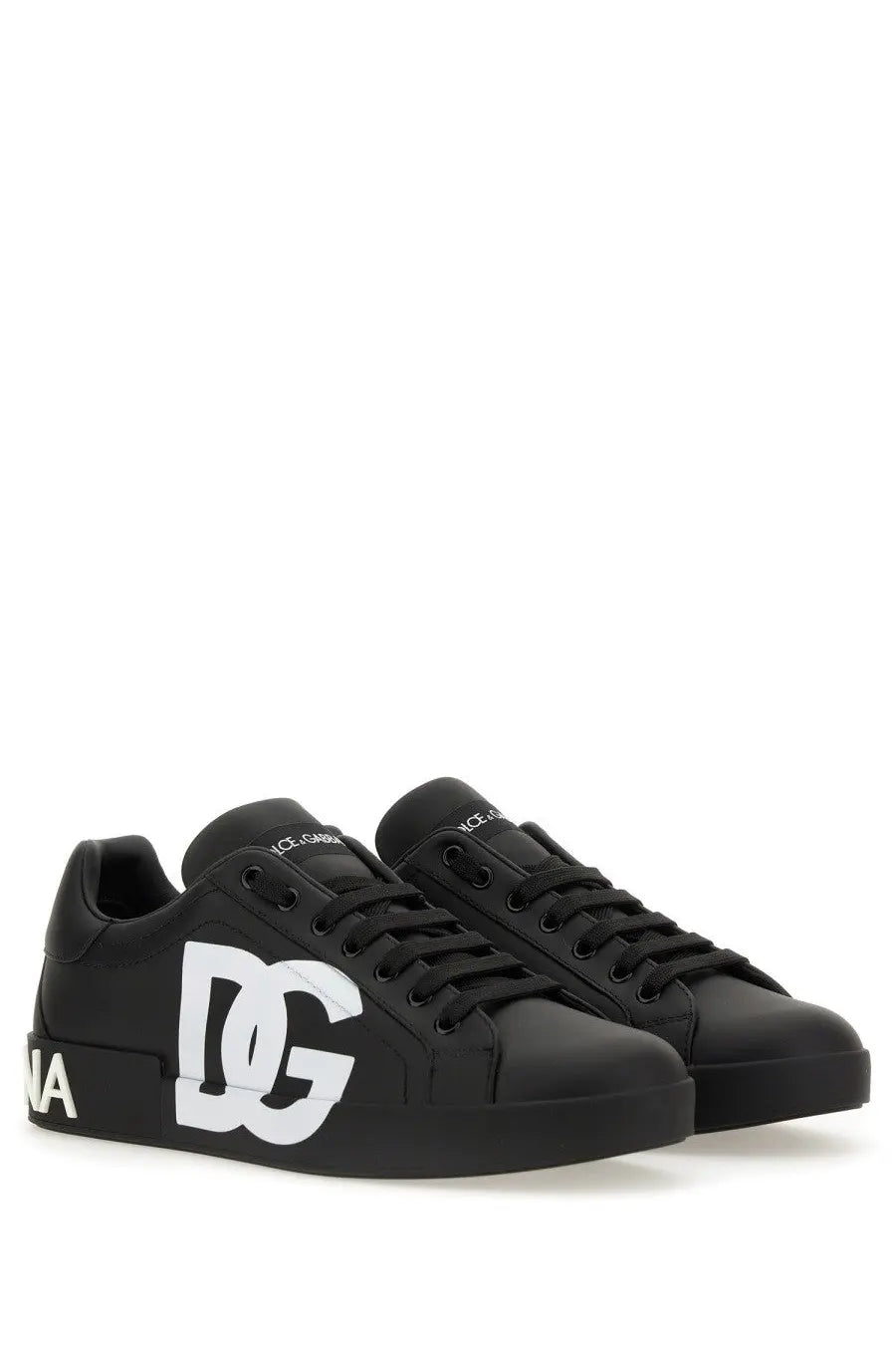 Dolce &amp; Gabbana men’s Portofino sneaker in black leather with bold white DG logo and matching laces on the side